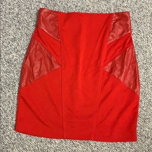 Red body-con skirt with pleather panels